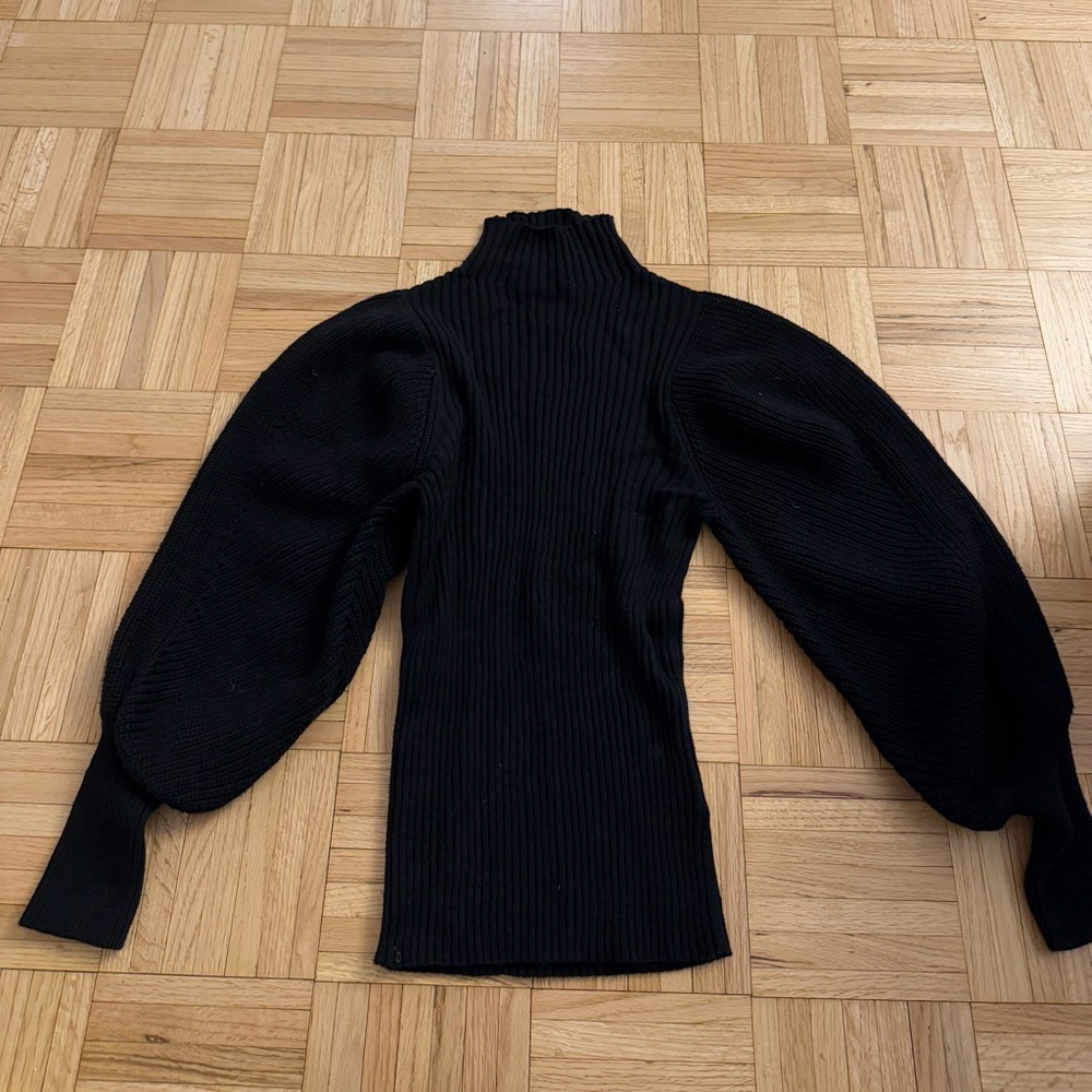 Black sweater with poofy sleeves